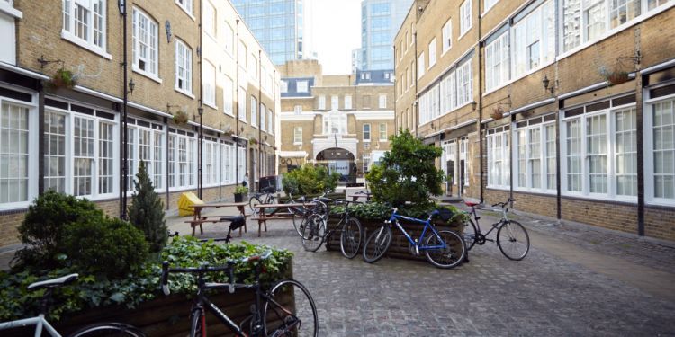 Sundial Court courtyard with planters and bikes
