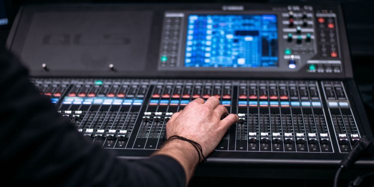 Production Arts students working at a sound desk