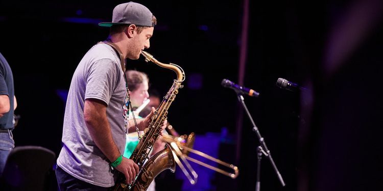 Man playing saxophone onstage