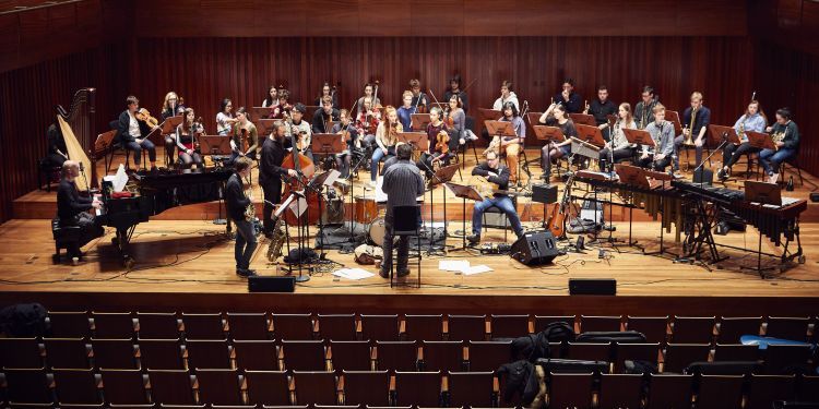 Guildhall Studio Orchestra on stage in Milton Court Concert Hall for a rehearsal