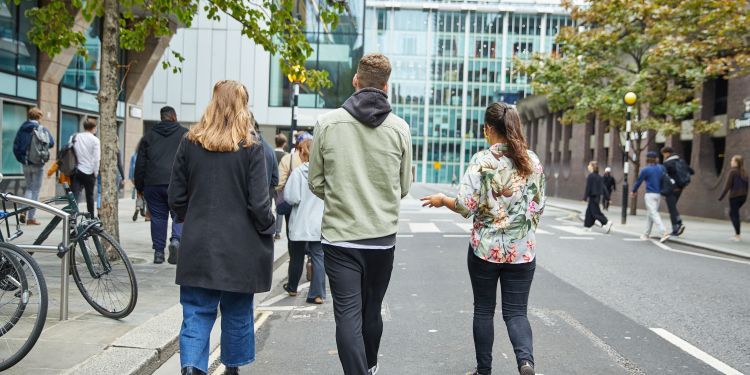 students walking on silk street
