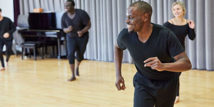 Actors dancing in a movement class