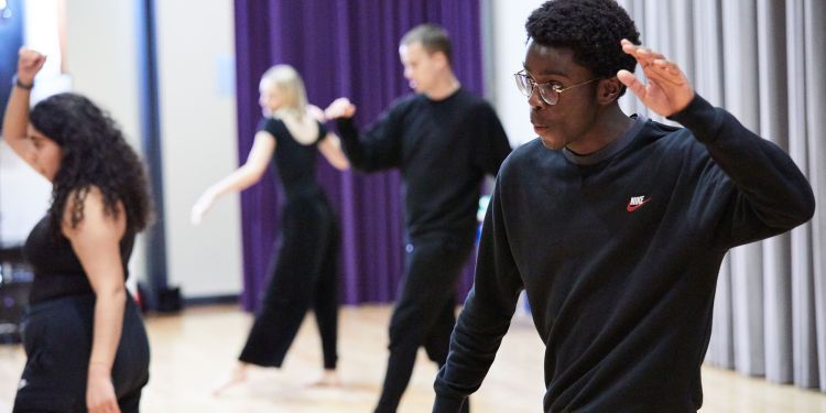 Actors dancing in a movement class