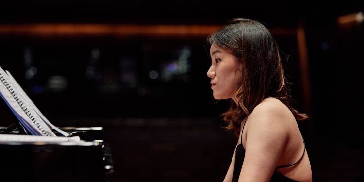 Pianist rehearsing in Milton Court Concert Hall