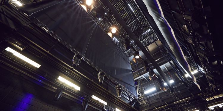 Looking up into the automation and lighting of the Milton Court Theatre