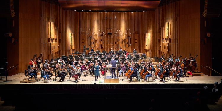 Guildhall Symphony Orchestra rehearse in the Barbican Hall