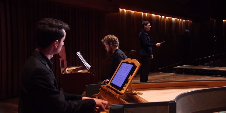 Harpsichord player and historical performance students peform in Milton Court Concert Hall