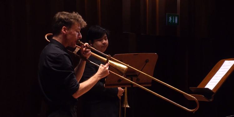 Guildhall musician playing a sackbut 