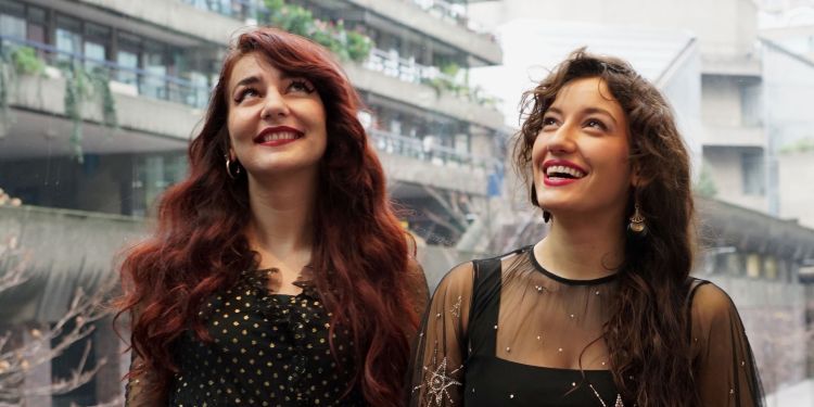 Singer and pianist in black dresses in Milton Court