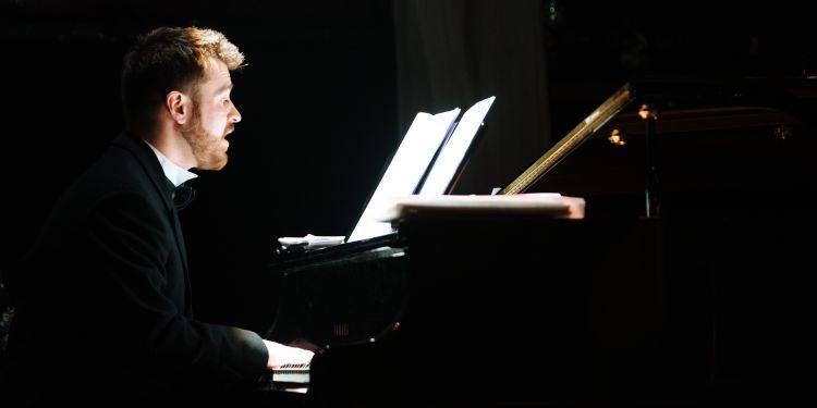 Repetiteur performs during an opera scenes rehearsal