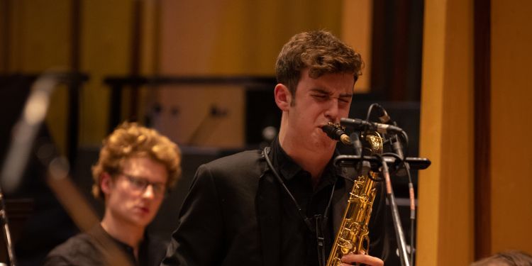 Saxophone player performs in the Guildhall Jazz Orchestra