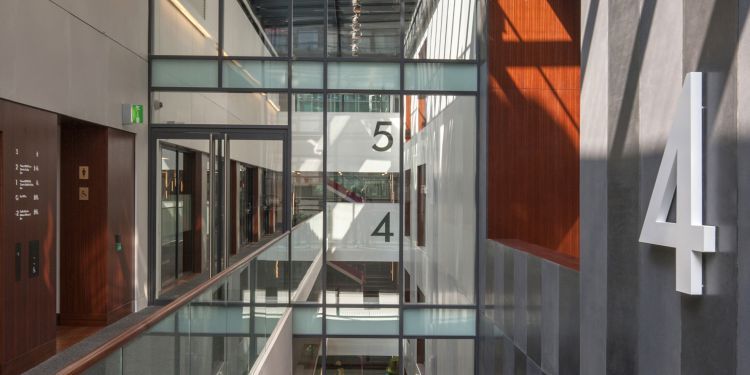 Level 4 corridor in Milton Court with sunlight streaming in through the skylights