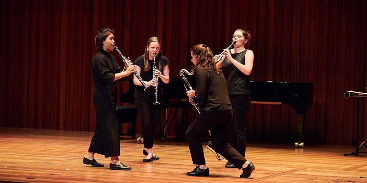 Four female clarinet players