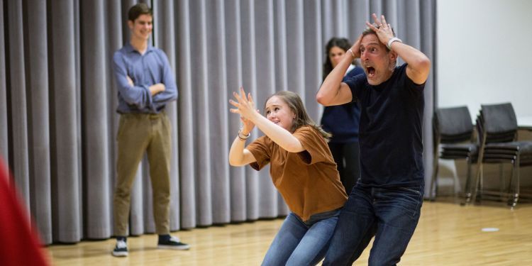 Two participants in an improvisation workshop