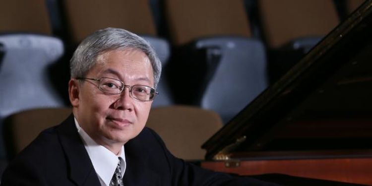 Gabriel Kwok sat at his piano