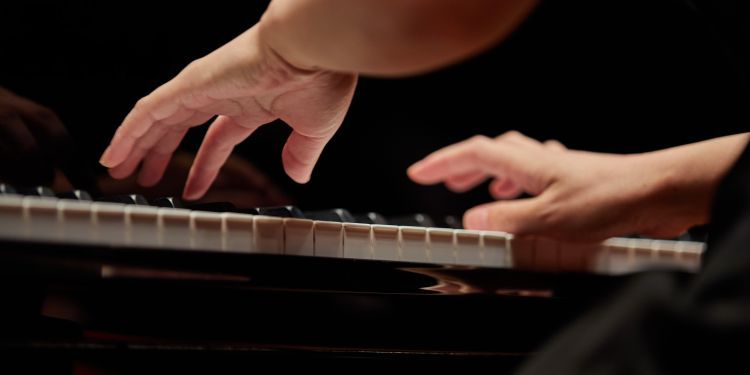 Close up of pianist's hands