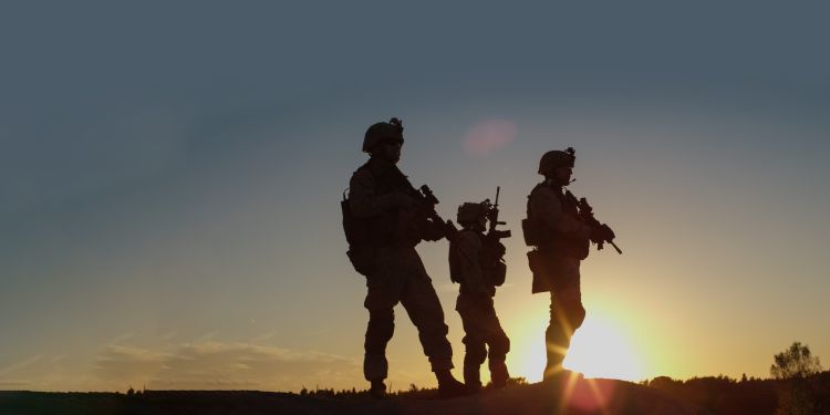 Days of Significance artwork - three soldiers in silhouette against sunrise