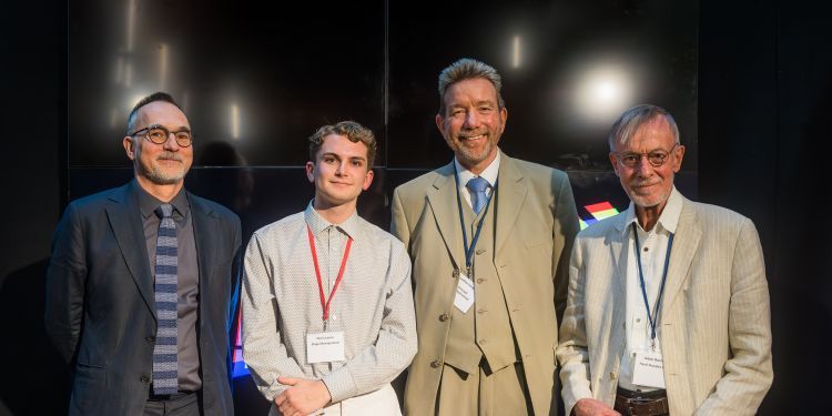 Student, Tom Licence receiving Hazel Sharples Prize from staff members