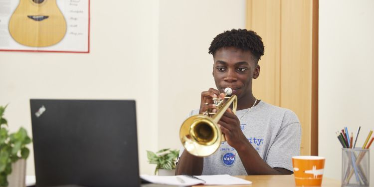 Boy playing a trumpet