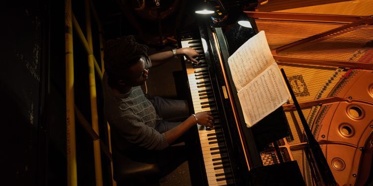 Student playing the piano