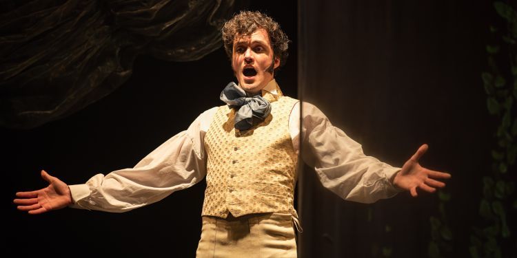 Photo of male student singing at the Spring Opera Scenes in 2023