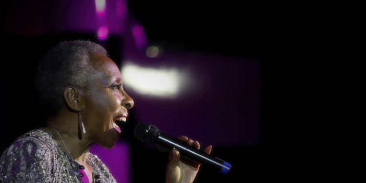 Jazz singer Elaine Delmar with microphone