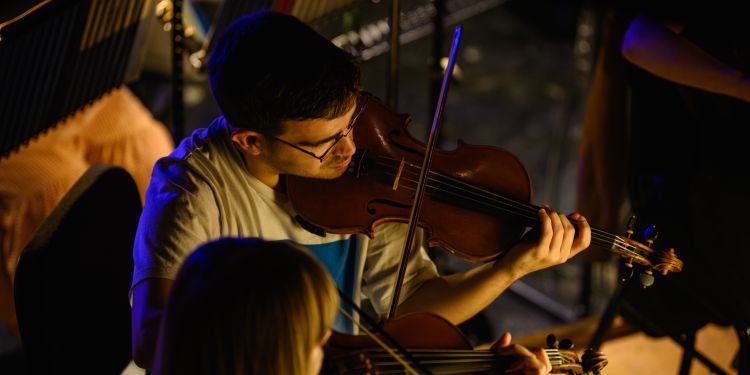 Student playing violin