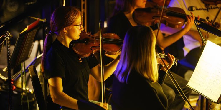 Student playing the violin
