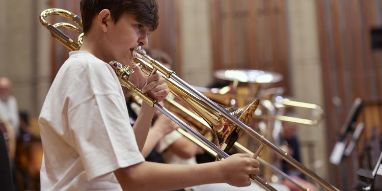 Junior Guildhall student playing trombone