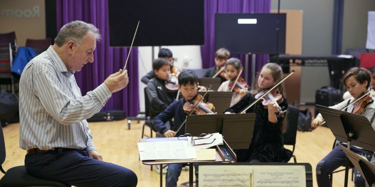 Group of Junior Guildhall students playing strings instruments