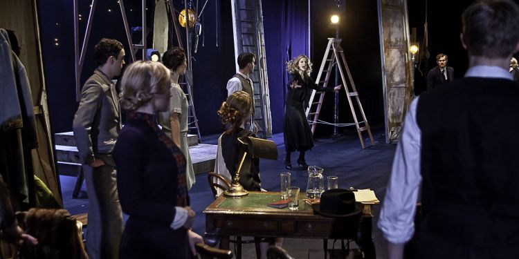 students working on set of a production