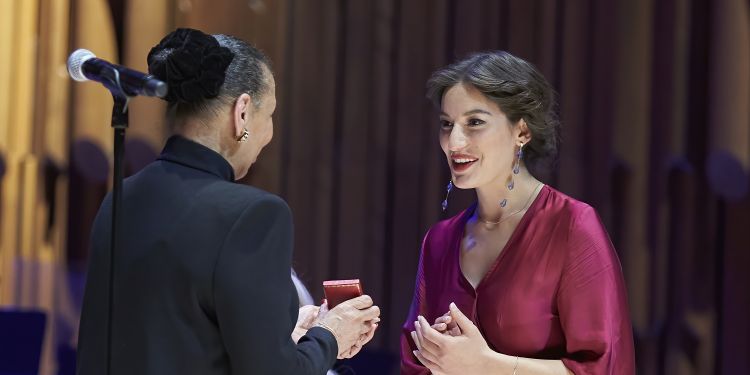 Gold Medal prize winner Alexandra Achillea Pouta receiving award on stage