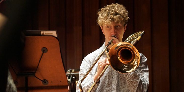 Student playing the trombone