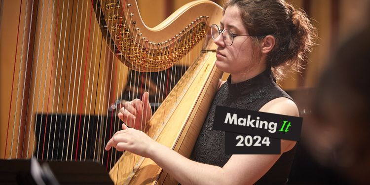 Student playing harp