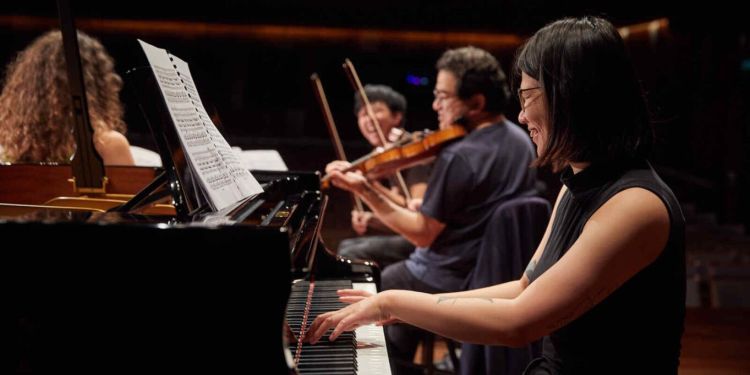 Image of performers in Milton Court