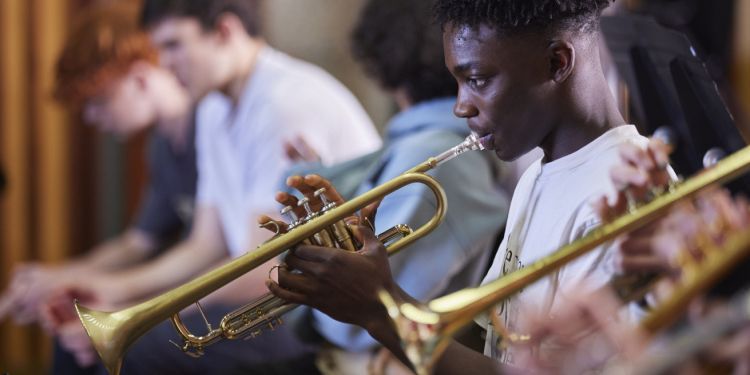 Junior Guildhall students playing trumpet 