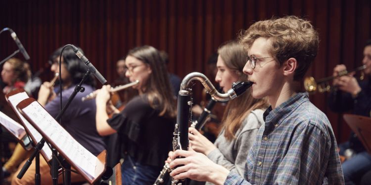 Students playing wind instruments