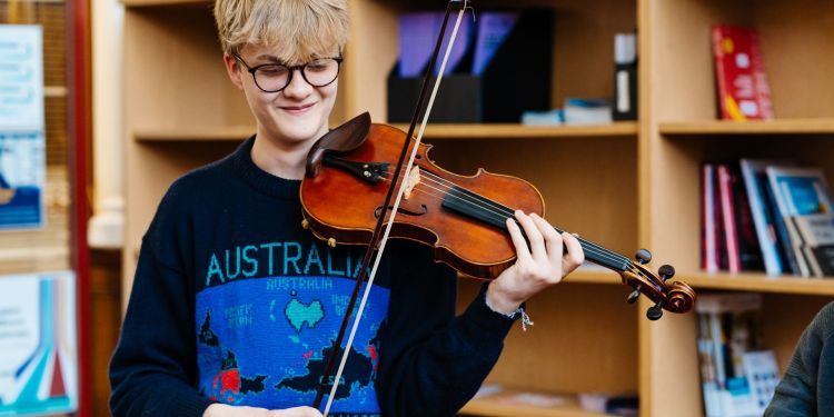Boy playing violin