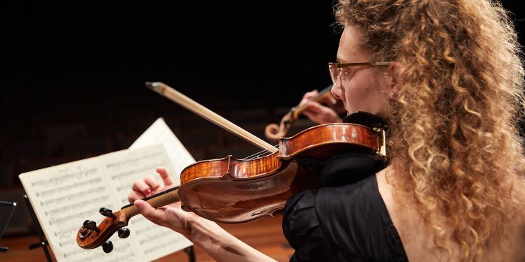 Student playing the violin