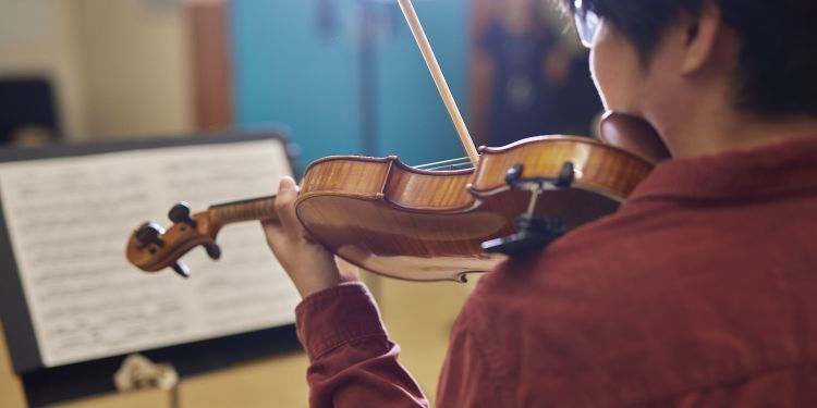 Student playing violin