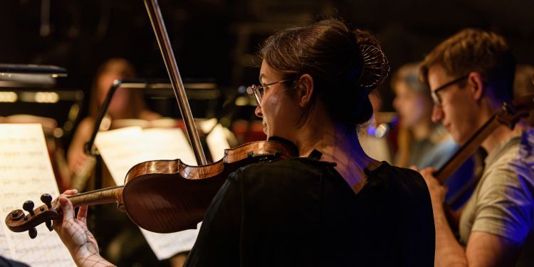 Student playing the violin