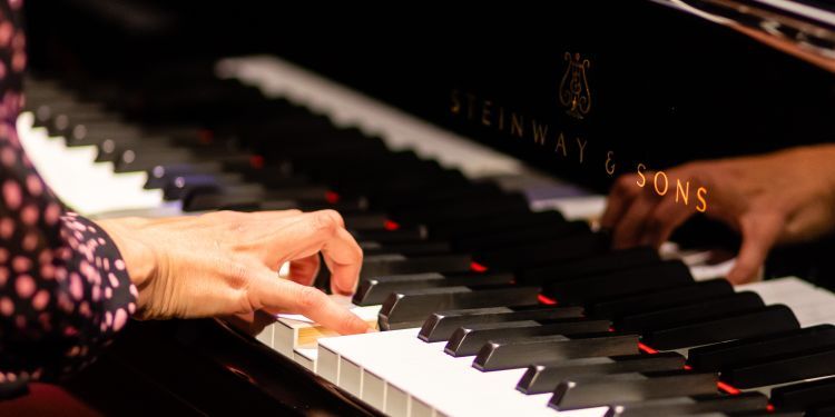 Student playing piano 