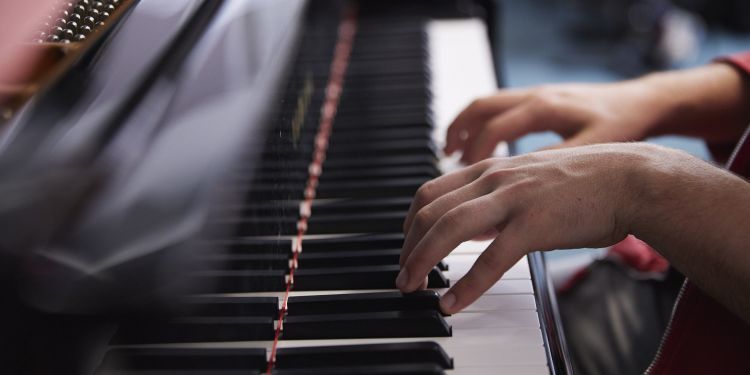 Student playing keyboard