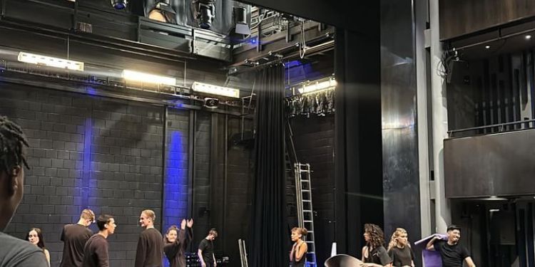 Acting students on stage ready for a drama session