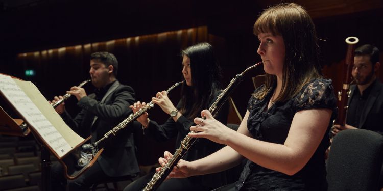 Student on stage playing cor anglais