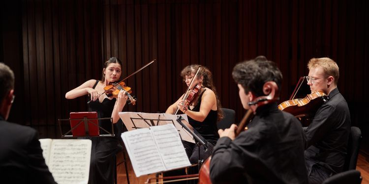 Chamber students performing on stage