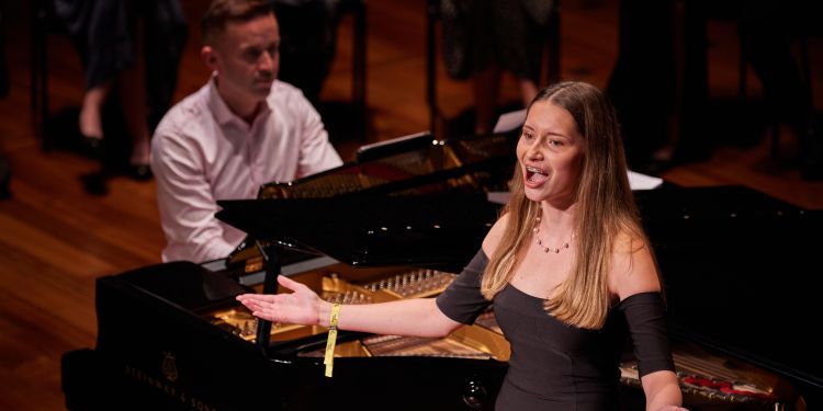 Short Courses - Summer Schools 2023 - Audition Preparation for Advanced Classical Singers - Participant with singing on stage (Paul Cochrane)