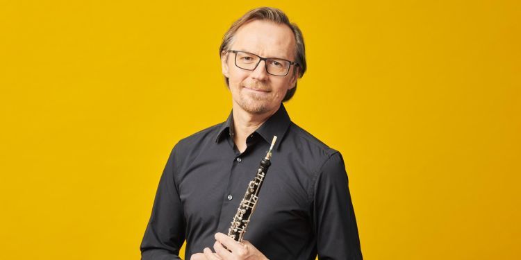 Jonathan Kelly pictured holding an oboe