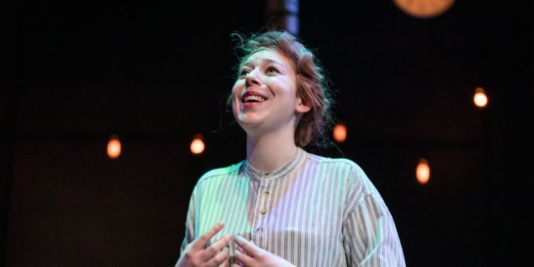 Vocal student singing on stage