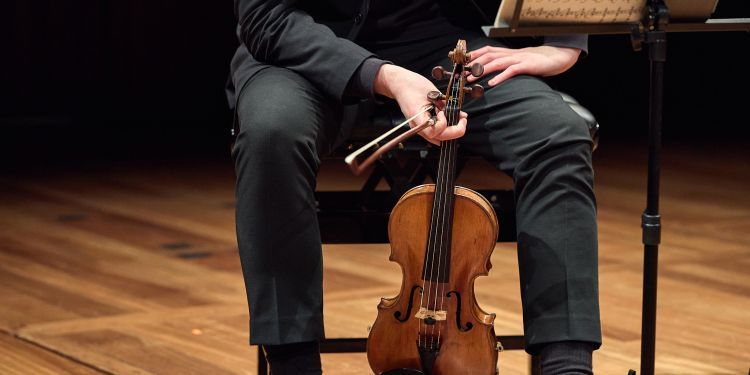 Guildhall student holding violin